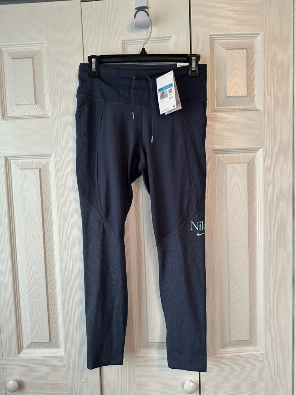 Nike Women's Thunder Blue Run Femme Fast Dri-FIT leggings (model DD5308-437)